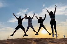 Morning Desert Safari with Dune Bashing, Camel Ride, Sand Board & Quad Biking