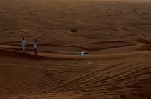 Morning Desert Safari with Dune Bashing, Camel Ride, Sand Board & Quad Biking