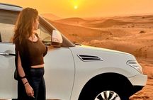 Evening Desert Safari with BBQ Dinner, Sandboarding and Camel Ride Experience