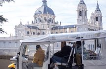 Tour of Historic and Modern Madrid with a guide in a yellow tuk tuk