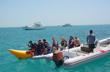 Hurghada paradise Island by Glass Bottom Boat enjoy Snorkeling and Banana Boat