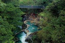 Guachipelin Zipline, River Tubing, Horseback Ride, Hot springs & Lunch Combo