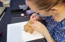 Carving a Korean Stone Seal with Jeongju in Insadong Seoul.