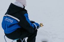 Ice Fishing by Snowmobile in Levi