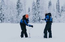 Ice Fishing by Snowmobile in Levi