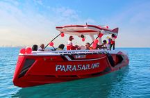 Parasailing in Dubai with Palm Jumeirah and JBR Beach views