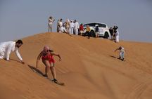 Dubai Desert Safari with Quad Bike, Dune Bashing, Camel Ride, Sand Boarding &BBQ