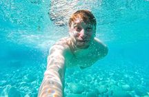 Kayak tour in Capri between caves and beaches. Photos included.