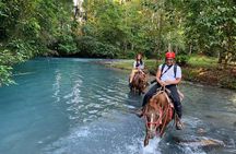 Río Celeste Full Day Pass Tubing and Horseback Riding.