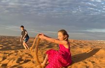Morning Desert Safari: Dune Bashing, Camel Ride & Sandboarding