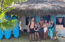 Surfing lesson at beautiful beach Playa Encuentro