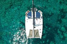 Milos caves snorkelling Catamaran Cruise in a small group 