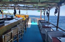 Catamaran Tiki Boat Sunset Snorkeling Dinner Cruise in Roatan