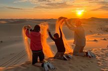 Desert Safari Abu Dhabi w/ Sand Boarding, Camel Ride & BBQ Dinner