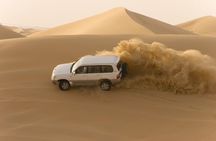 Desert Safari Abu Dhabi w/ Sand Boarding, Camel Ride & BBQ Dinner