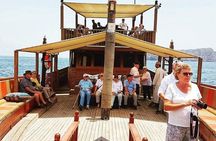Omani Traditional Dhow Cruise: Sunset and Muscat Coastal View