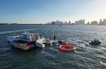 Aquatic Adventure: Boat Tour with Jetskis, Tubing, and Open Bar