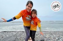 Surf lesson and Bike rental experience