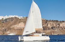 Santorini Gold Catamaran Cruise with BBQ, Drinks and Hotel Pickup