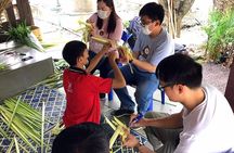 Meet Thai locals and tour Maeklong Railway Market with lunch