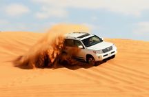 Evening Guided Tour with BBQ Dinner in Dubai Desert 