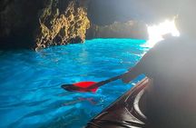 Kayak Trip to Hidden blue Cave, with lunch & fruits.