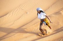 Dubai Half-day Red Dunes bashing with Sandboarding, Camel &Falcon