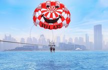 Parasailing in Dubai with Palm Jumeirah and JBR Beach views