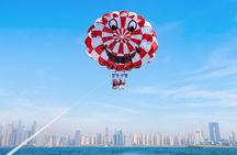 Parasailing in Dubai with Palm Jumeirah and JBR Beach views