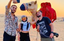 Morning Red Dune Safari with Sandboarding and Camel Ride