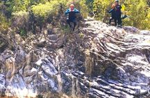 Rappelling, Hiking and Jumping into the water in the Matacanes Canyon