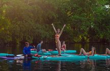 Paddleboarding and/or kayaking tour at sunrise in the lagoon of Bacalar