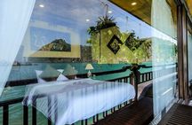 Overnight Halong Bay Cruise Including Transfer Service and Kayaking or Bamboo Boat Activities