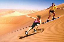 Sunrise Desert Safari with Quad Biking and Camel Riding in Dubai