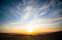 Sunrise Desert Safari with Quad Biking and Camel Riding in Dubai
