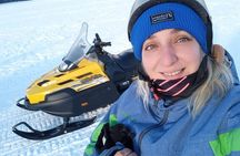 Snow day on snowmobiles, snowshoe hike and culipatín