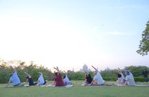 Yoga Class with Taj Mahal Backdrop