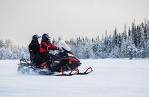 Two hours Snowmobile Safari Driving into Lappish Forests
