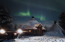 Northern lights safari by snowmobile