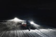 Northern lights safari by snowmobile