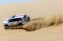 Full-day Qatar desert safari: dune bashing, sandboarding, camels