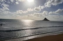 Paddle boarding and hiking adventure at Mokoli'i Island.