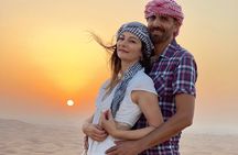 Sunrise Desert Safari with Sand Boarding and Camel Ride