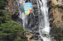 PARAGLIDING over giant waterfalls private tour (optional Guatape) from Medellin