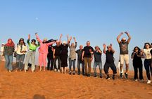 Desert Safari with BBQ Dinner and Camel Ride Experience in Dubai