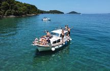 Visit 2 Islands of Zadar on a traditional wooden boat during half-day trip