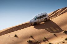 Sunrise/Morning Dune Drive with Camel Trek & Sand Surfing