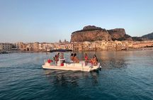Discovering Cefalù's Coastline Activity on a Mini Catamaran