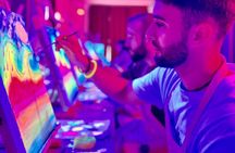 Paint a neon fluorescent picture while drinking unlimited wine