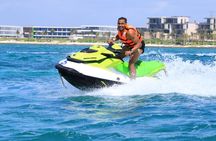 Drive a Waverunner in the beautiful Maroma Beach with transport